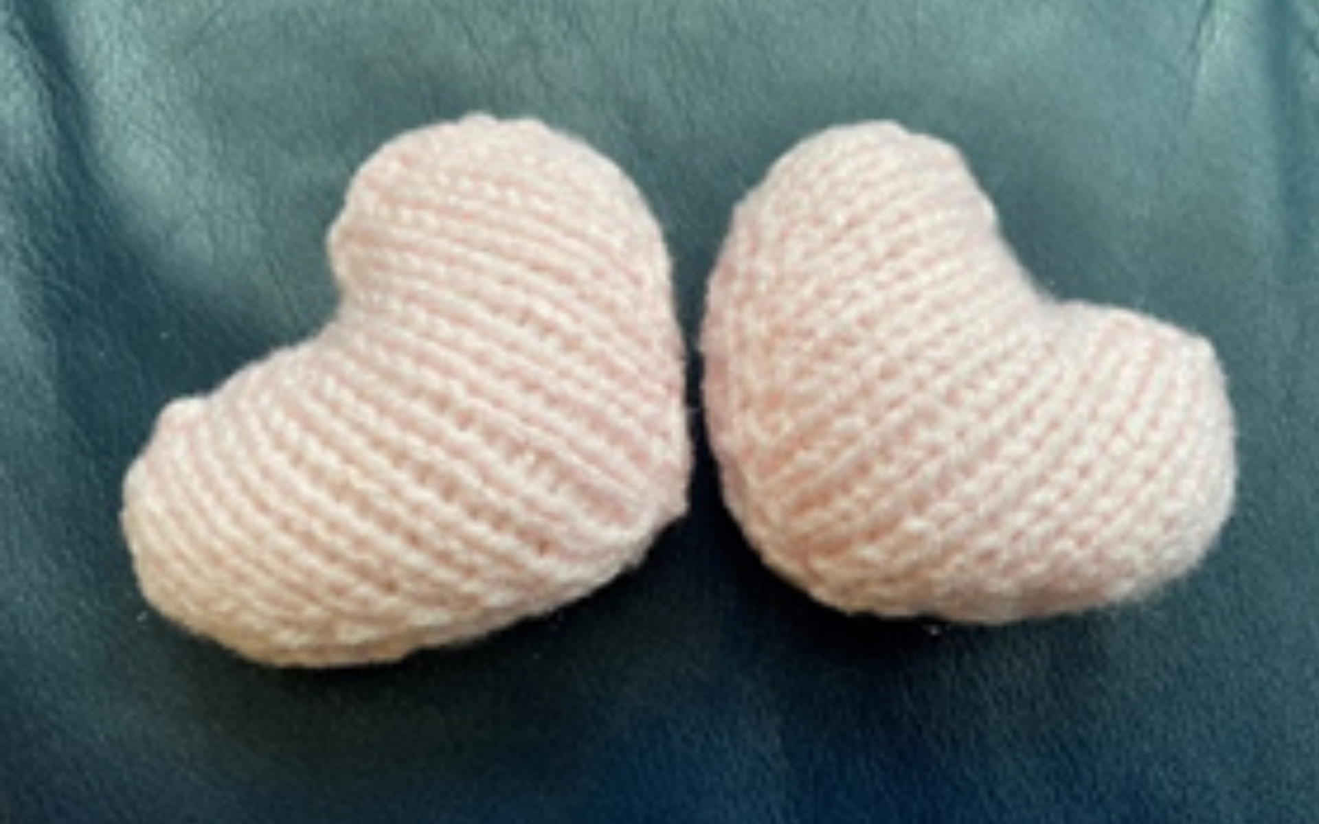 Pink knitted hearts.
