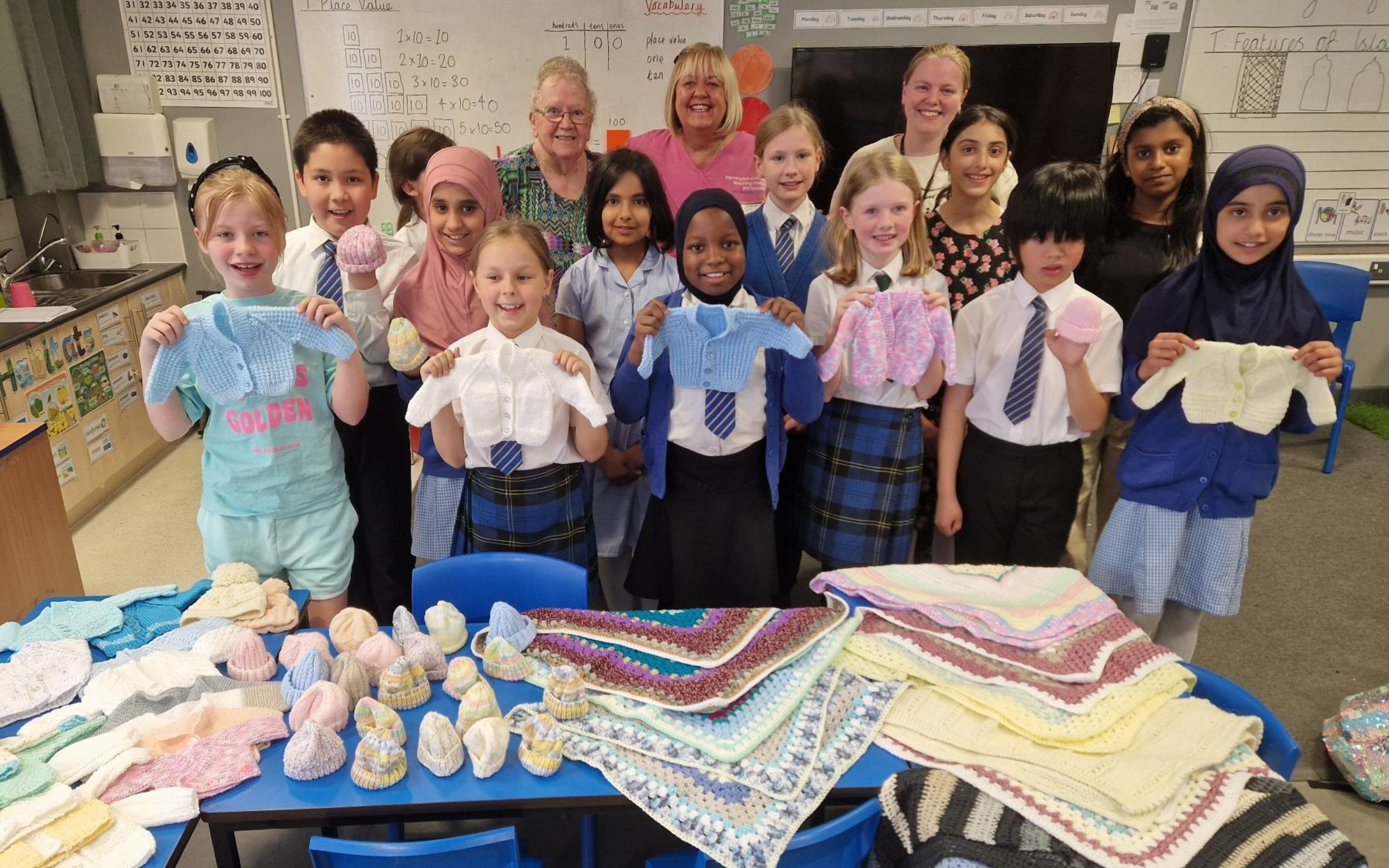 Primary school knitting club keeps newborn babies warm on Neonatal Unit
