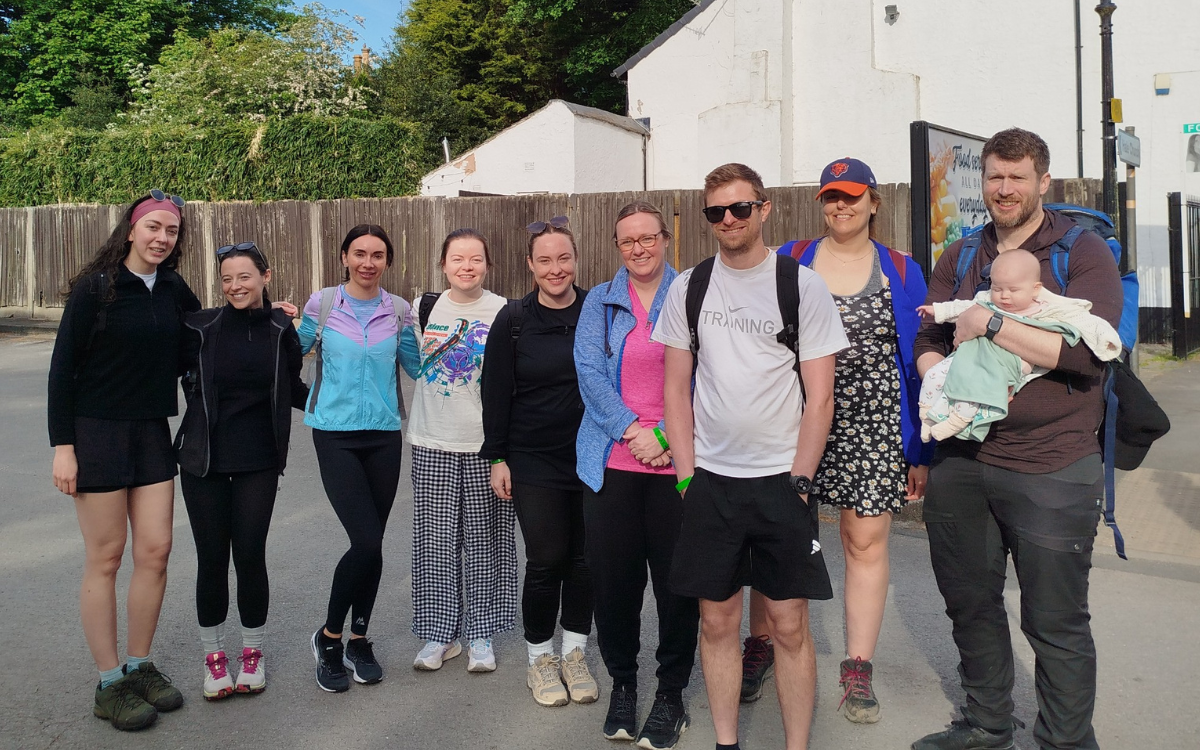Team takes on marathon walk to raise funds in memory of much-loved colleague